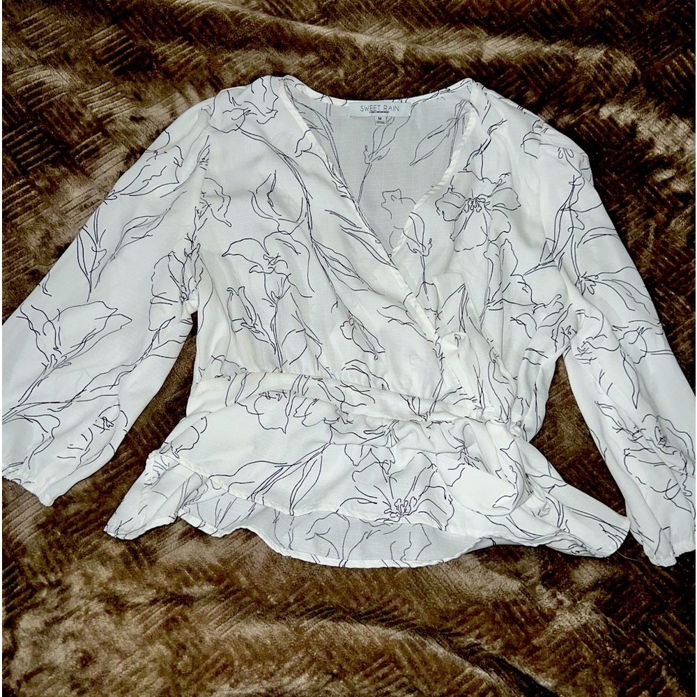 White and black blouse.